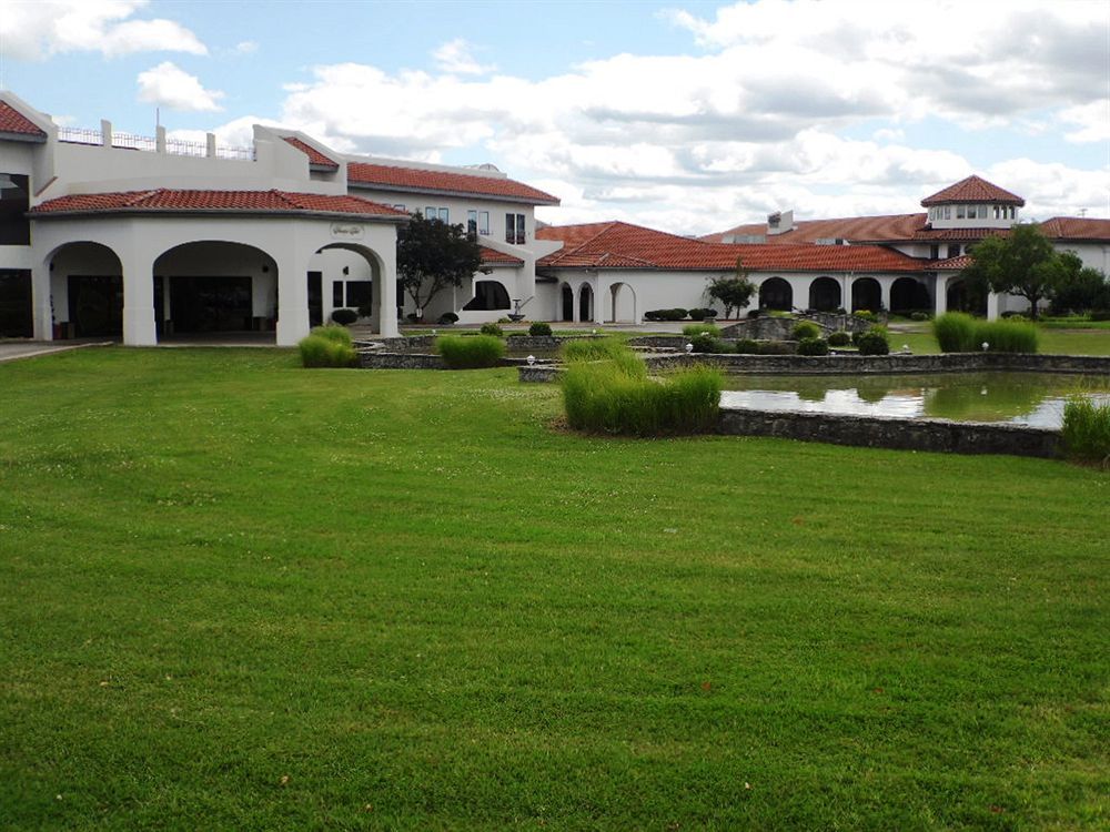 Regalia Hotel & Conference Center Village of Four Seasons Exterior photo